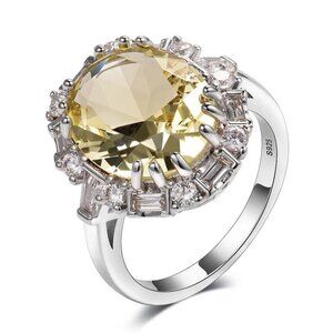 Women's Chunky Citrine Ring with an Oval Cut and Baguette Accent Stones